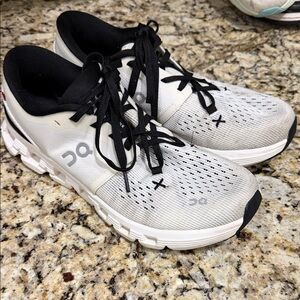 On Running Men's Black and White Athletic Shoes